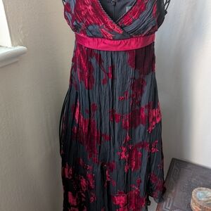 Bebe "B" Beautiful in this smooth chic halter dress. Fully lined.-
